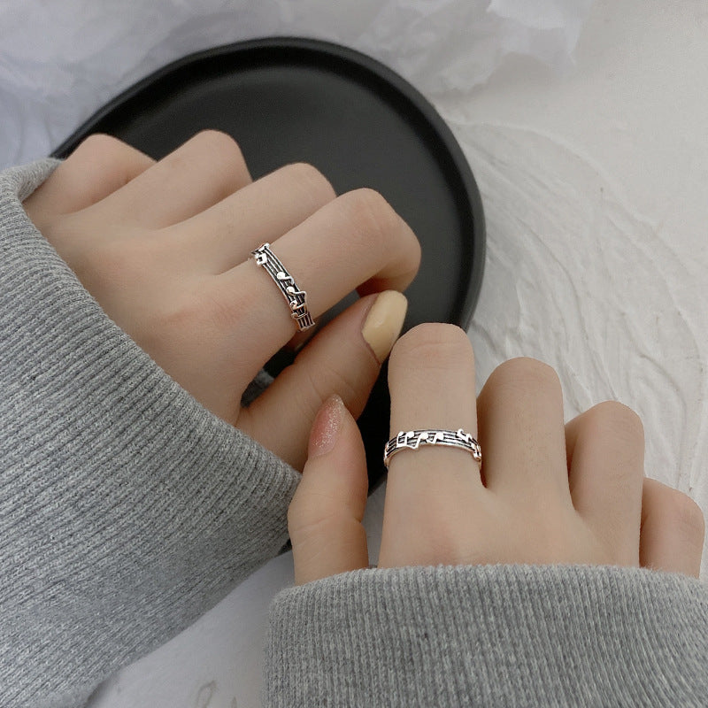 Silver music notes ring