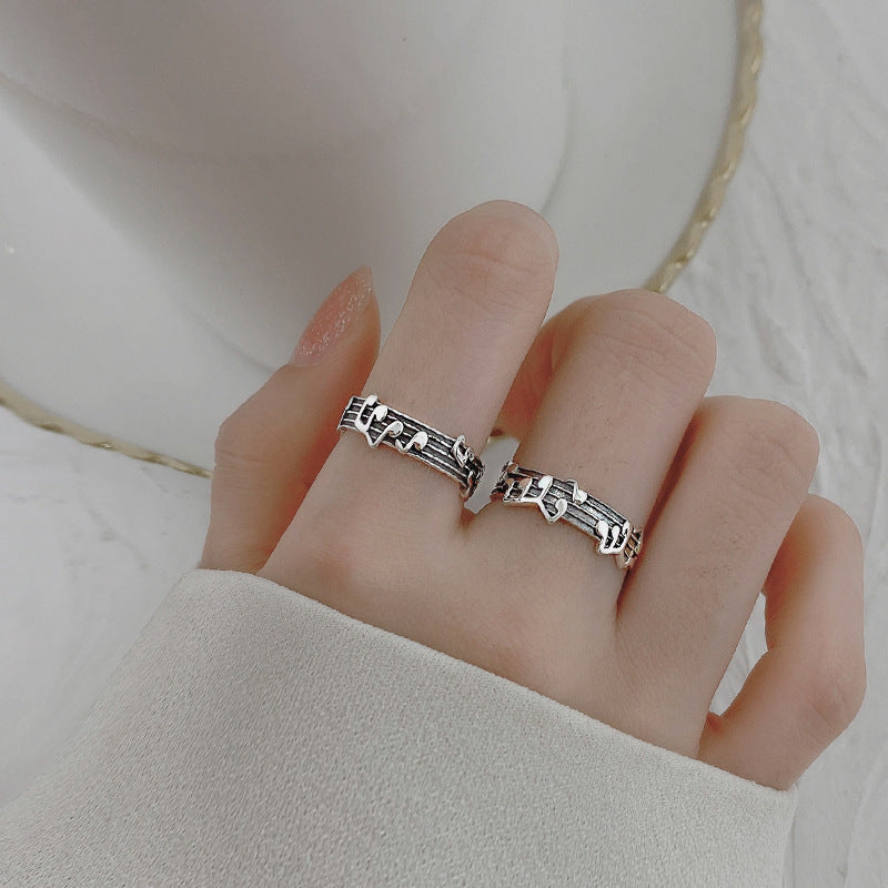 Silver music notes ring