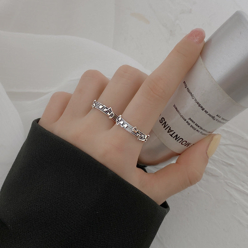 Silver music notes ring