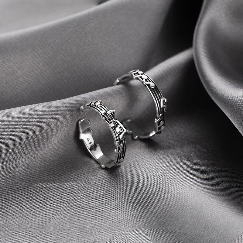 Silver music notes ring