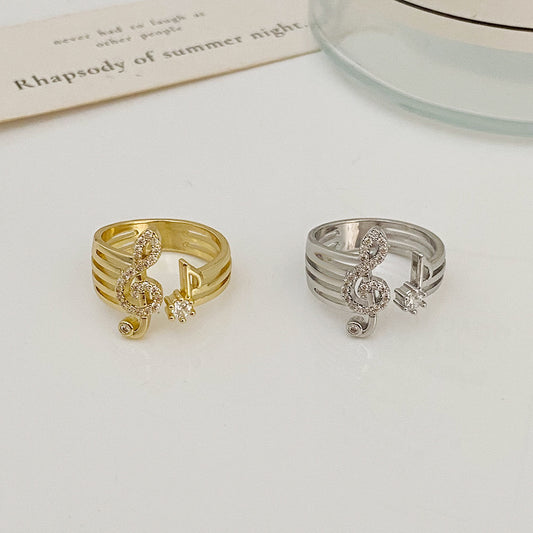 Fashion ring with micro zircon and musical symbol